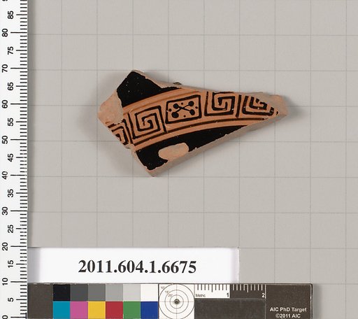 Terracotta fragment of a kylix (drinking cup)