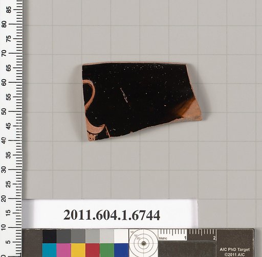 Terracotta rim fragment of a kylix (drinking cup)