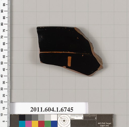 Terracotta rim fragment of a kylix (drinking cup)