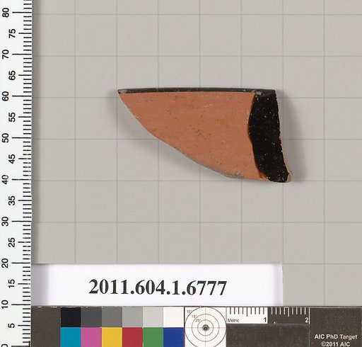 Terracotta fragment of a kylix (drinking cup)