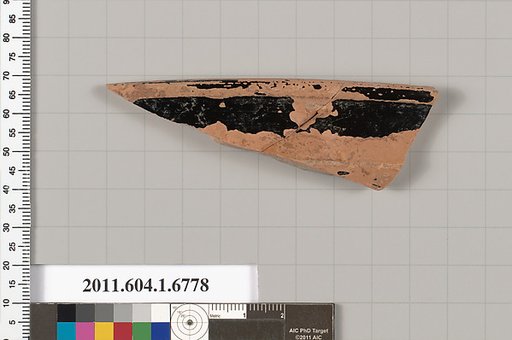 Terracotta fragment of a kylix (drinking cup)