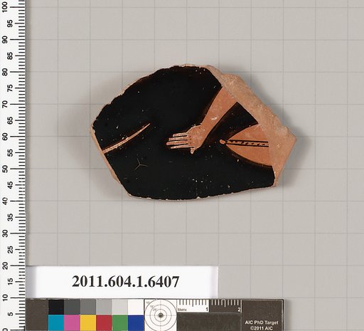 Terracotta fragment of a kylix (drinking cup)