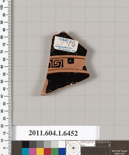 Terracotta fragment of a kylix (drinking cup)