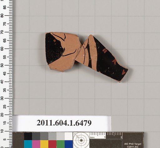 Terracotta fragment of a kylix (drinking cup)
