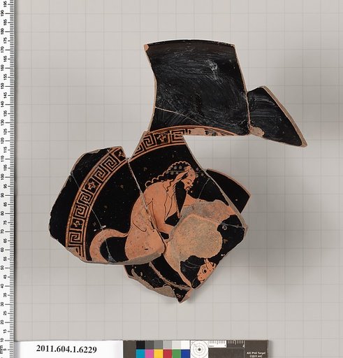 Terracotta fragment of a kylix (drinking cup)