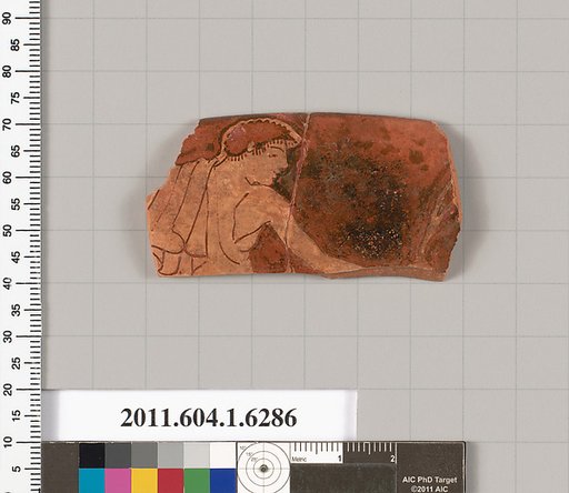 Terracotta rim fragment of a kylix (drinking cup)