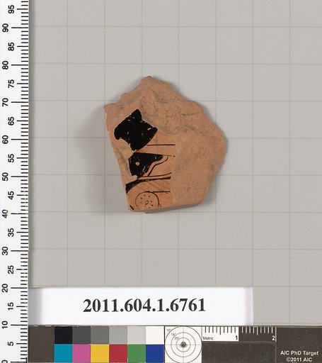 Terracotta fragment of a kylix (drinking cup)