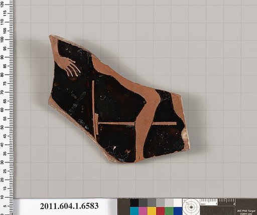 Terracotta fragment of a kylix (drinking cup)