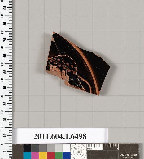 Terracotta fragment of a kylix (drinking cup)