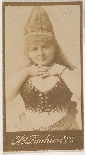 Actress wearing pointed cap, from the Actresses series (N664) promoting Old Fashion Fine Cut Tobacco