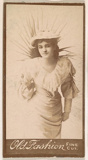 Actress wearing costume with reeds attached at back, from the Actresses series (N664) promoting Old Fashion Fine Cut Tobacco