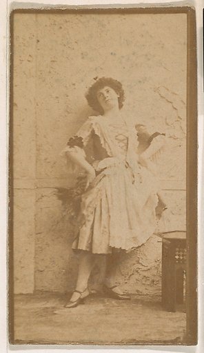 Actress leaning against wall, from the Actresses series (N664) promoting Old Fashion Fine Cut Tobacco
