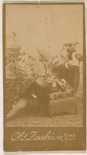 Actress reclining on chair, from the Actresses series (N664) promoting Old Fashion Fine Cut Tobacco