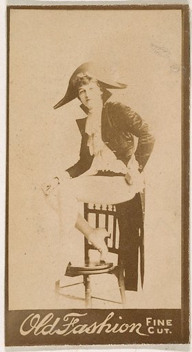 Seated actress wearing military-inspired costume, from the Actresses series (N664) promoting Old Fashion Fine Cut Tobacco