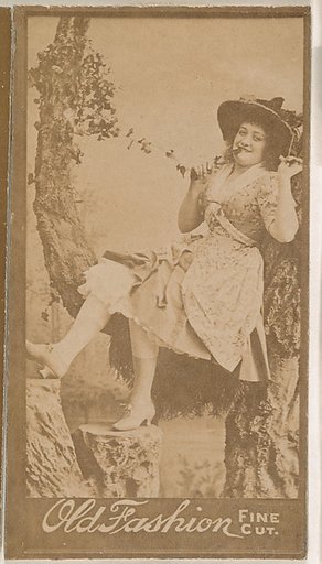 Actress holding ivy vine, from the Actresses series (N664) promoting Old Fashion Fine Cut Tobacco
