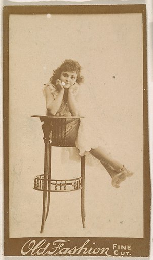 Actress posing on back of tall chair, from the Actresses series (N664) promoting Old Fashion Fine Cut Tobacco