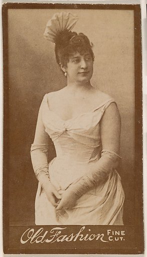 Actress wearing feathered headpiece, from the Actresses series (N664) promoting Old Fashion Fine Cut Tobacco