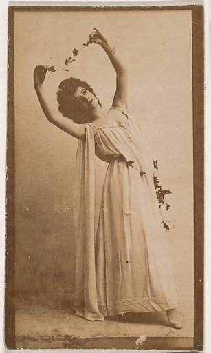 Actress holding vine above head, from the Actresses series (N664) promoting Old Fashion Fine Cut Tobacco