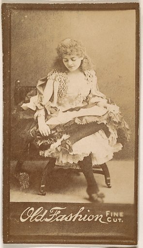 Actress gazing down at lap, from the Actresses series (N664) promoting Old Fashion Fine Cut Tobacco