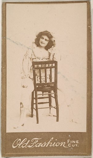 Actress straddling chair, from the Actresses series (N664) promoting Old Fashion Fine Cut Tobacco