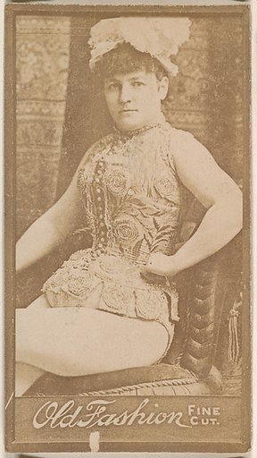 Actress seated in chair, from the Actresses series (N664) promoting Old Fashion Fine Cut Tobacco