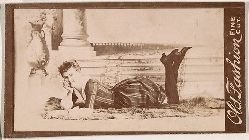 Actress on fur rug, from the Actresses series (N664) promoting Old Fashion Fine Cut Tobacco
