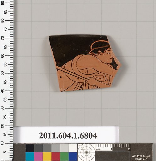 Terracotta rim fragment of a kylix (drinking cup)