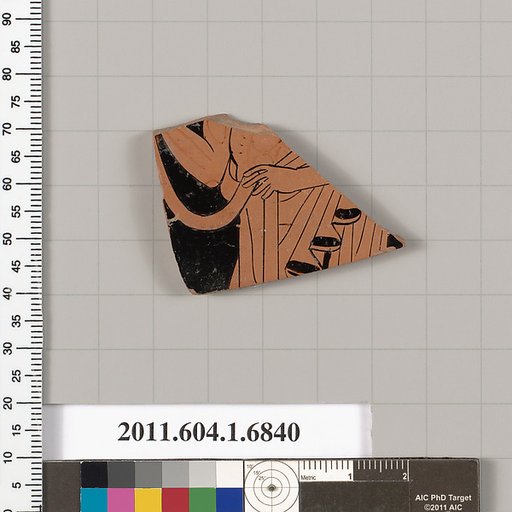 Terracotta fragment of a kylix (drinking cup)
