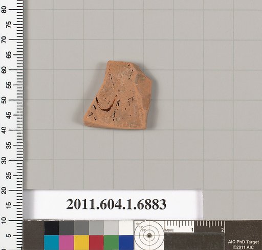 Terracotta fragment of a kylix (drinking cup)