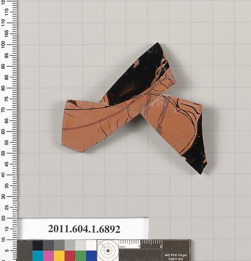 Terracotta fragment of a kylix (drinking cup)