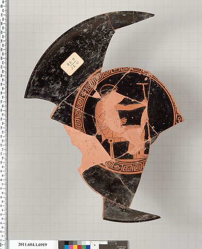 Terracotta fragment of a kylix (drinking cup)