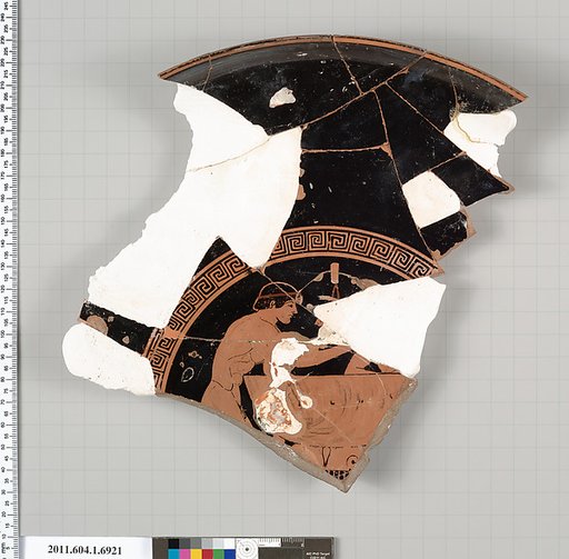 Terracotta fragment of a kylix (drinking cup)