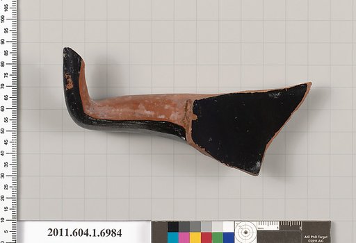 Terracotta fragment of a kylix (drinking cup)