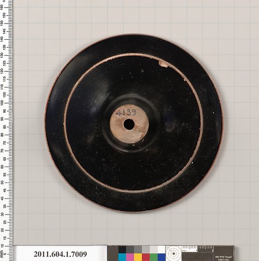 Terracotta fragment of a kylix (drinking cup)