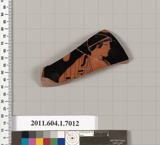 Terracotta fragment of a kylix (drinking cup)