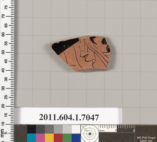 Terracotta fragment of a kylix (drinking cup)