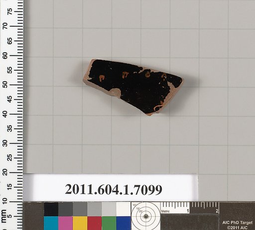 Terracotta fragment of a kylix (drinking cup)