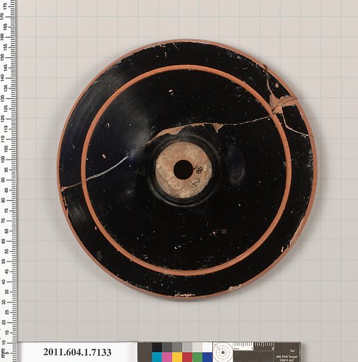 Terracotta fragment of a kylix (drinking cup)