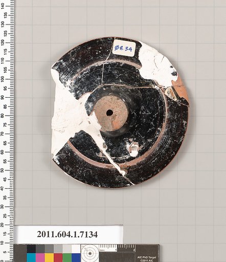 Terracotta fragment of a kylix (drinking cup)