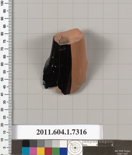 Terracotta fragment of a kylix (drinking cup)
