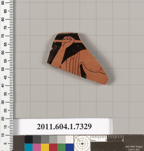 Terracotta rim fragment of a kylix (drinking cup)