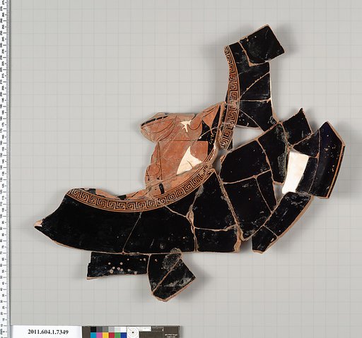 Terracotta fragment of a kylix (drinking cup)