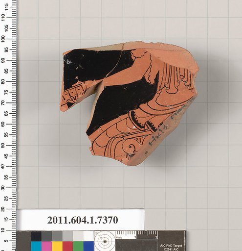 Terracotta fragment of a kylix (drinking cup)