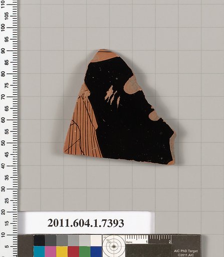Terracotta fragment of a kylix (drinking cup)
