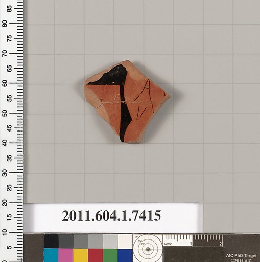 Terracotta fragment of a kylix (drinking cup)