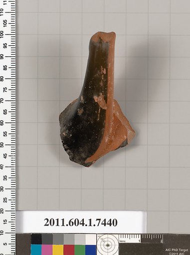 Terracotta fragment of a kylix (drinking cup)