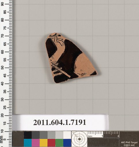 Terracotta fragment of a kylix (drinking cup)