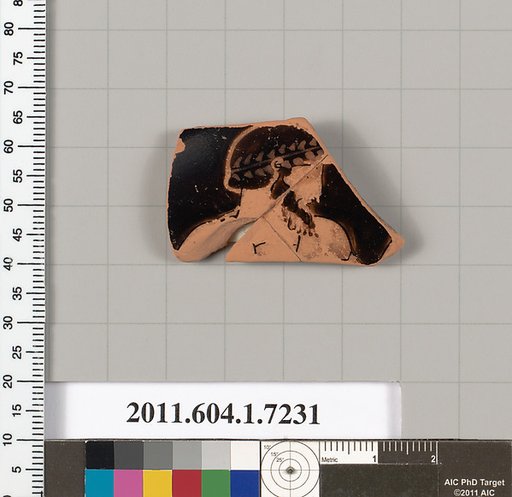 Terracotta fragment of a kylix (drinking cup)