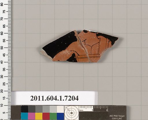 Terracotta fragment of a kylix (drinking cup)