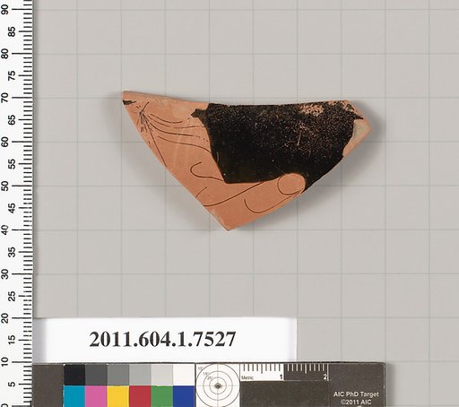Terracotta fragment of a kylix (drinking cup)